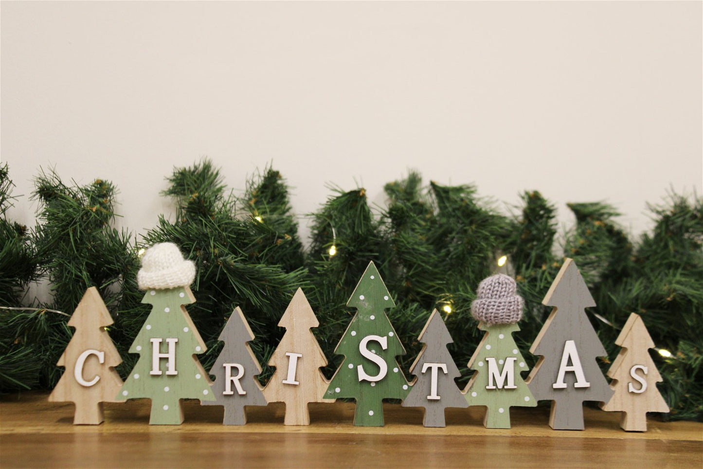 Row of Christmas Trees Decoration With Hats Green